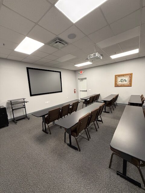 Your Guide to Serviced Office Suites Across Central Florida 1 furnished serviced office suites with desk and city view in Central Florida