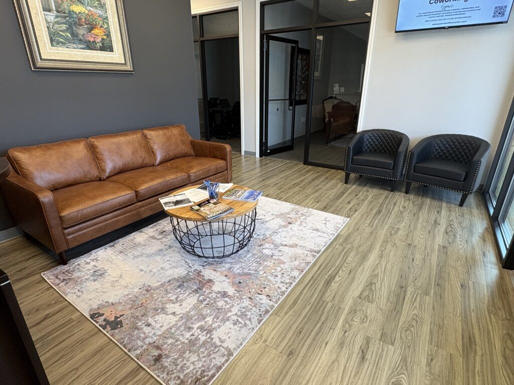 Coworking in Ocala, FL: Desks, Day Passes and Meeting Rooms 3 professional working at a premier coworking desk in Ocala FL office