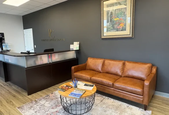 furnished office suites with reception desk at Premier Office Center